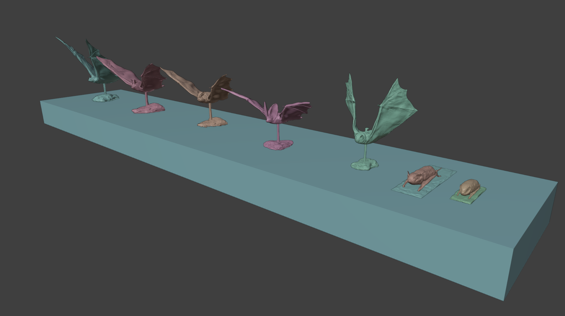 A comparison of several three-dimensional bat models in different poses and sizes.