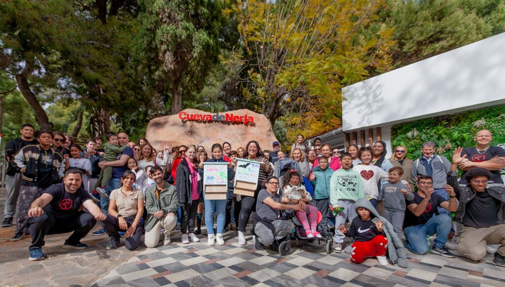 Participants and the Murciélagos Málaga team at an educational event near the Cueva de Nerja.